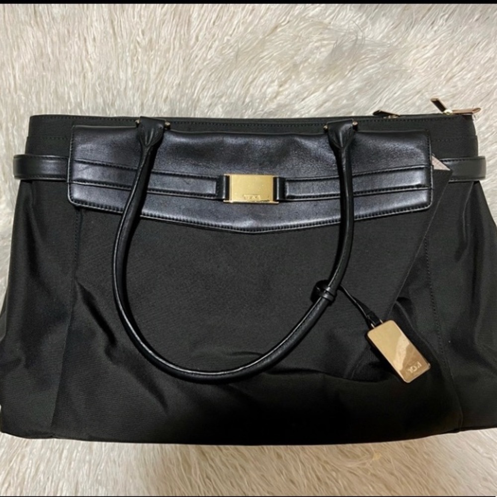Tumi Larkin Hayward Briefcase Computer Bag Black Gold hardware. Good condition.